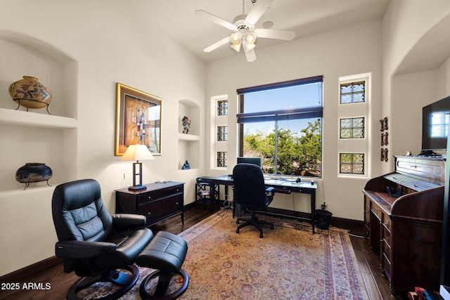 8154 E Tecolote Cir, Scottsdale, AZ 85266 - office with built in features, hardwood / wood-style flooring, a ceiling fan, a high ceiling, and arched walkways