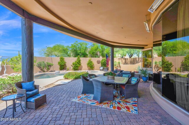 8154 E Tecolote Cir, Scottsdale, AZ 85266 - fenced backyard featuring a patio area and outdoor dining area