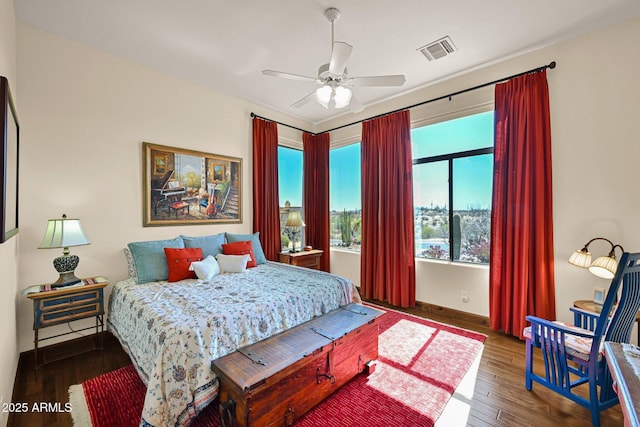 8154 E Tecolote Cir, Scottsdale, AZ 85266 - bedroom featuring wood-type flooring and a ceiling fan