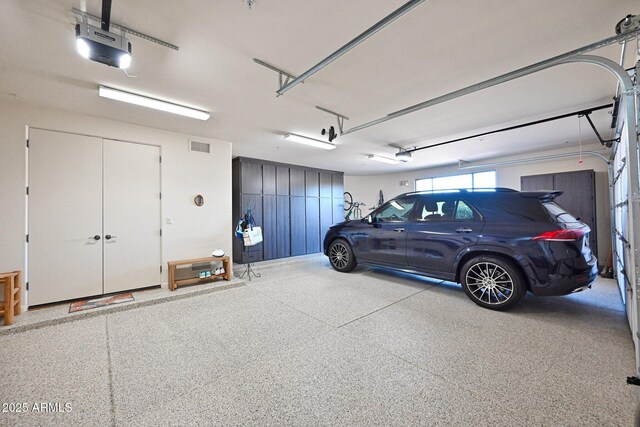 8154 E Tecolote Cir, Scottsdale, AZ 85266 - garage featuring a garage door opener