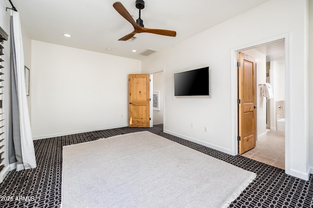 unfurnished bedroom featuring connected bathroom, ceiling fan, and carpet flooring