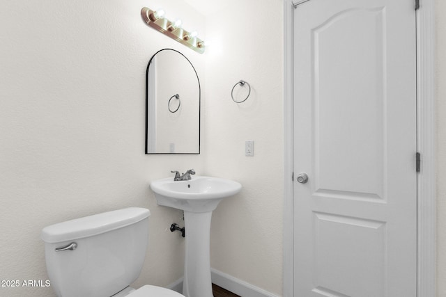 12852 N Mountainside Dr Unit 2, Fountain Hills, AZ 85268 - half bathroom featuring toilet and a sink