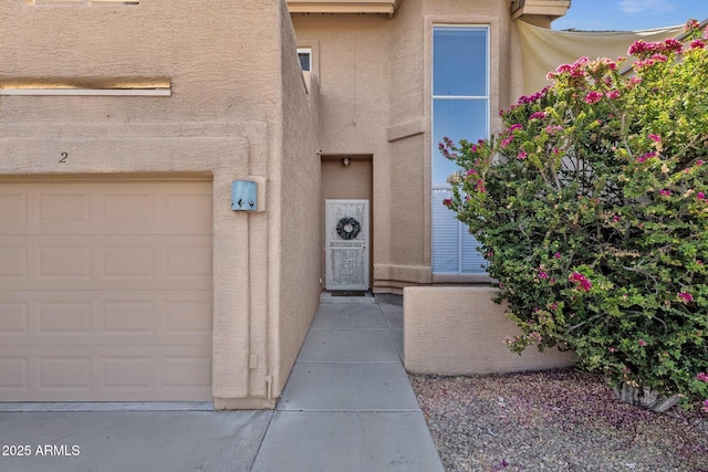 12852 N Mountainside Dr Unit 2, Fountain Hills, AZ 85268 - property entrance featuring a garage and stucco siding
