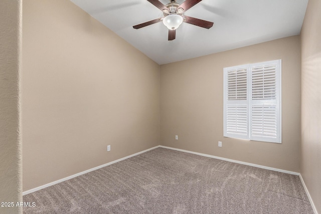 unfurnished room with ceiling fan and carpet floors