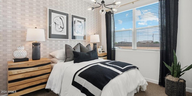 5549 E Mearn Rd, San Tan Valley, AZ 85140 - carpeted bedroom featuring baseboards and a chandelier