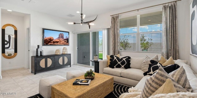 5549 E Mearn Rd, San Tan Valley, AZ 85140 - living area featuring a chandelier, light tile patterned flooring, baseboards, and recessed lighting