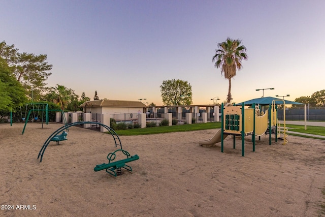 view of playground at dusk