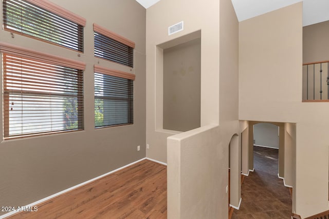 hallway featuring dark hardwood / wood-style floors