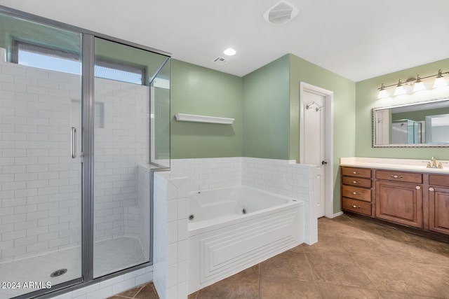 bathroom with vanity, tile patterned floors, and independent shower and bath