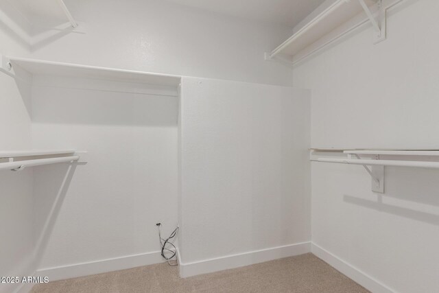 15087 N 86th Dr, Peoria, AZ 85381 - spacious closet featuring light carpet