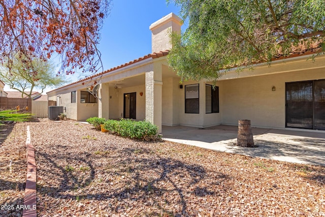 15087 N 86th Dr, Peoria, AZ 85381 - rear view of property with fence, a patio, a tile roof, stucco siding, and cooling unit