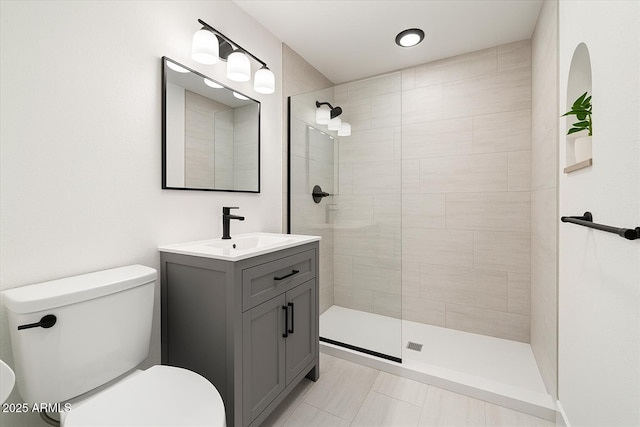 1209 N 87th St, Scottsdale, AZ 85257 - bathroom with toilet, a tile shower, and vanity