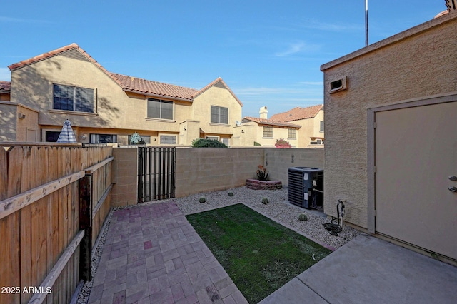 view of patio with central AC unit