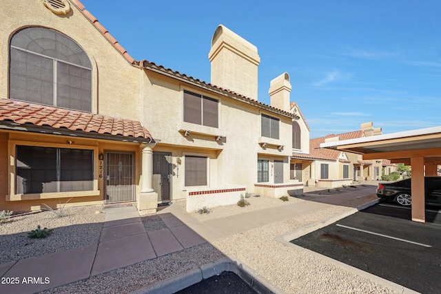 exterior space featuring a carport