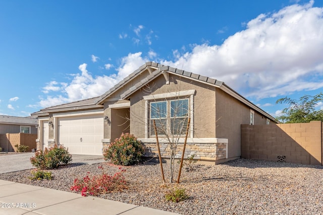 view of front of property featuring a garage