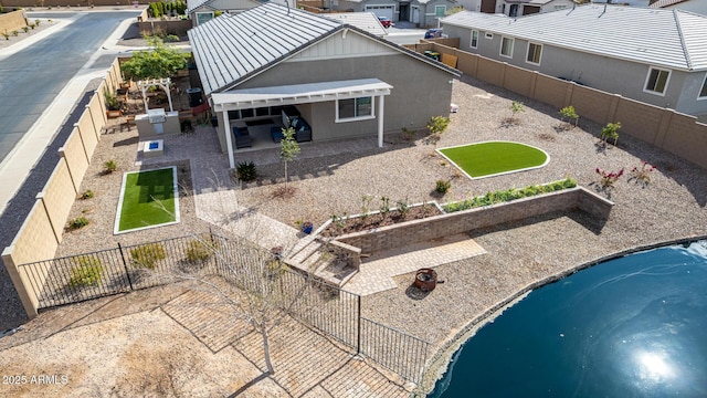 rear view of house with a patio area