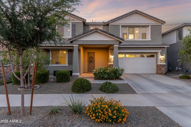 23042 E Excelsior Ave, Queen Creek, AZ 85142 - view of front of home with driveway, stucco siding, and a garage