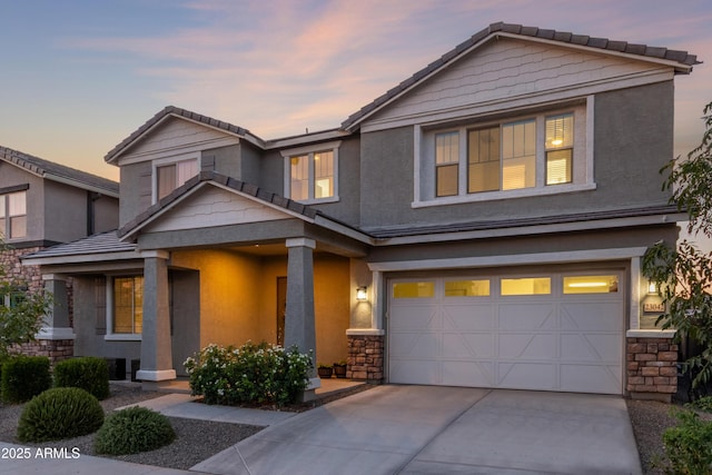 23042 E Excelsior Ave, Queen Creek, AZ 85142 - view of front of home with a garage, driveway, stucco siding, stone siding, and a tile roof