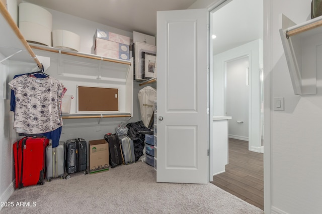 23042 E Excelsior Ave, Queen Creek, AZ 85142 - walk in closet with wood finished floors