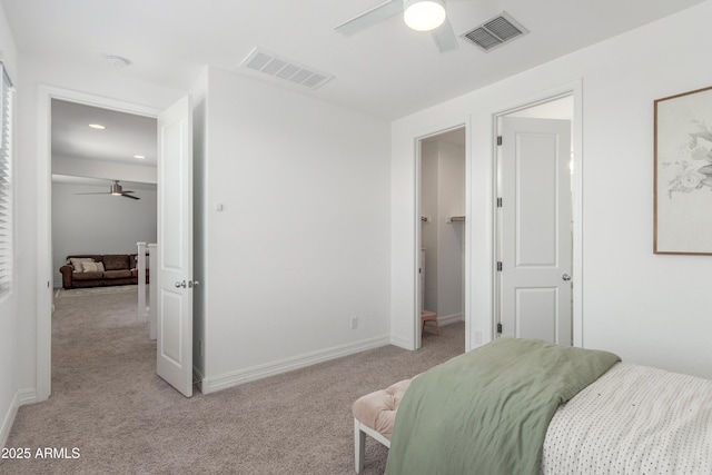 23042 E Excelsior Ave, Queen Creek, AZ 85142 - bedroom featuring light colored carpet, a ceiling fan, recessed lighting, and a walk in closet