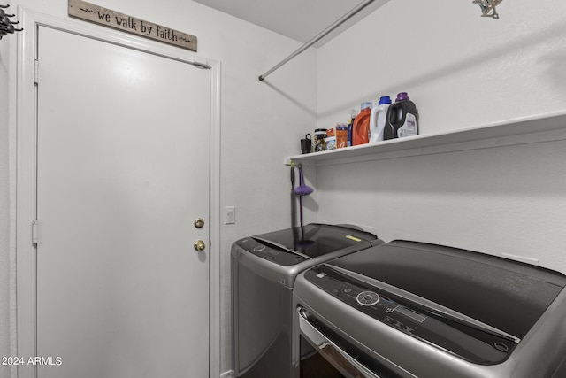 laundry room featuring laundry area and washer and clothes dryer