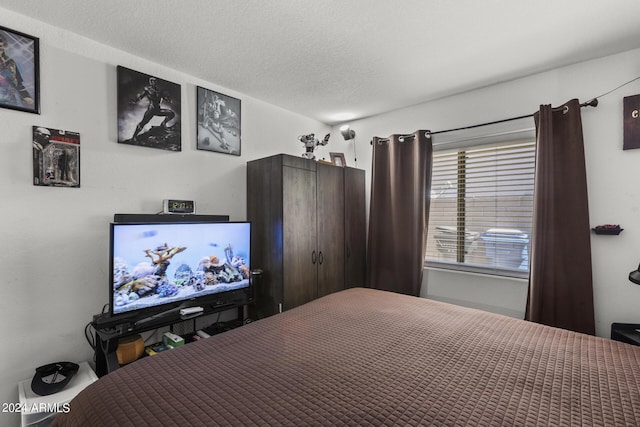 bedroom with a textured ceiling