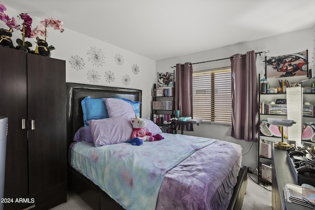 bedroom with light colored carpet