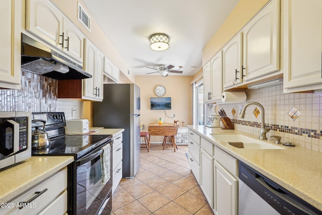 17024 N Pinion Ln, Sun City, AZ 85373 - kitchen with under cabinet range hood, a sink, dishwasher, a ceiling fan, and black range with electric stovetop