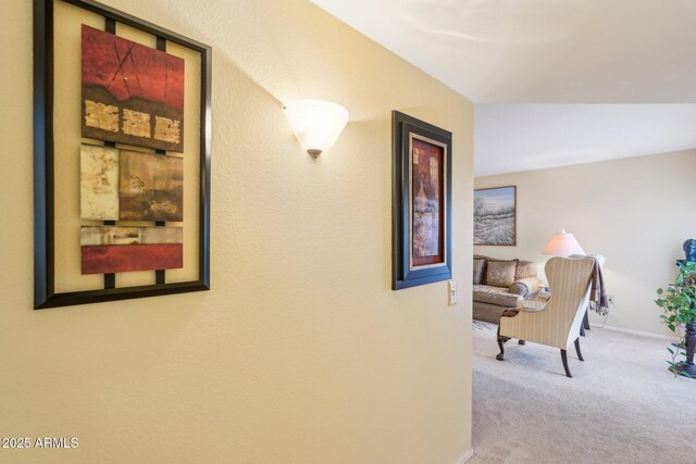 17024 N Pinion Ln, Sun City, AZ 85373 - corridor featuring baseboards and carpet
