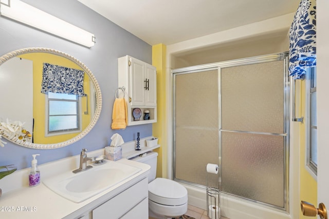 17024 N Pinion Ln, Sun City, AZ 85373 - full bath with a shower with shower door, toilet, and vanity