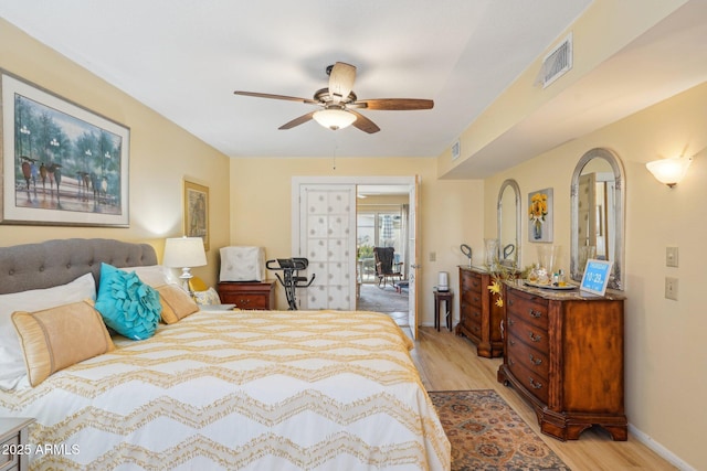 17024 N Pinion Ln, Sun City, AZ 85373 - bedroom featuring baseboards, light wood-style floors, ceiling fan, and visible vents