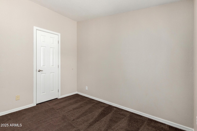 5901 E Leonora St, Mesa, AZ 85215 - unfurnished room featuring baseboards and dark colored carpet