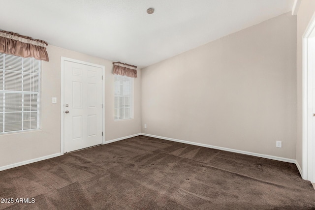 5901 E Leonora St, Mesa, AZ 85215 - spare room with baseboards and dark colored carpet