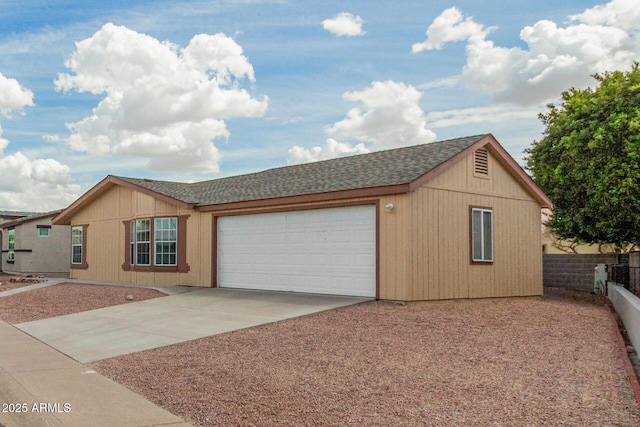 5901 E Leonora St, Mesa, AZ 85215 - ranch-style house with an attached garage, roof with shingles, driveway, and fence