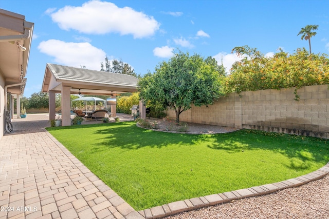 view of yard with a patio and a gazebo