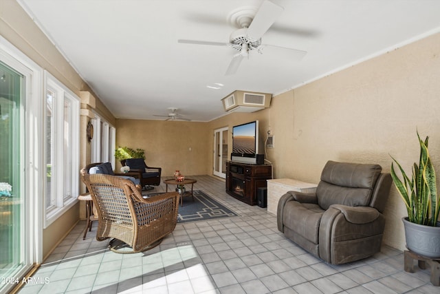 sunroom / solarium with ceiling fan