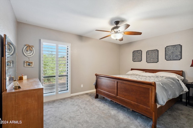 carpeted bedroom featuring ceiling fan and access to exterior