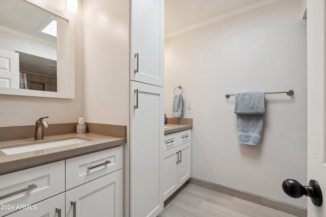 bathroom featuring vanity, crown molding, a shower with shower curtain, and hardwood / wood-style floors