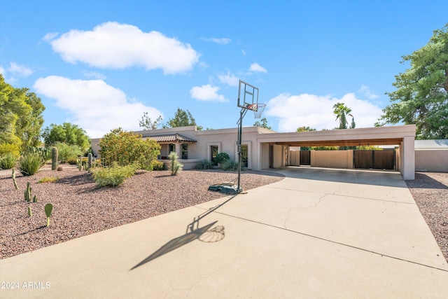 view of front of home with a carport