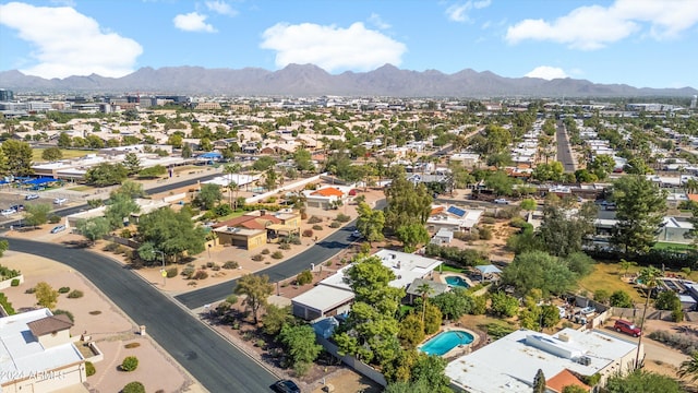 drone / aerial view featuring a mountain view