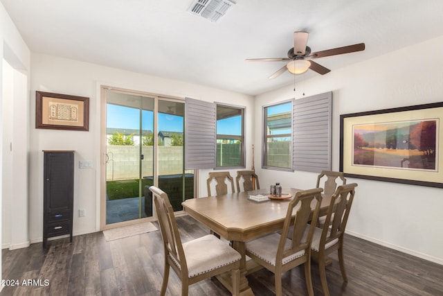 dining space featuring ceiling fan, dark hardwood / wood-style flooring, and a wealth of natural light