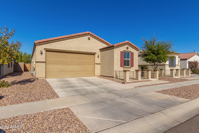 view of front of property with a garage