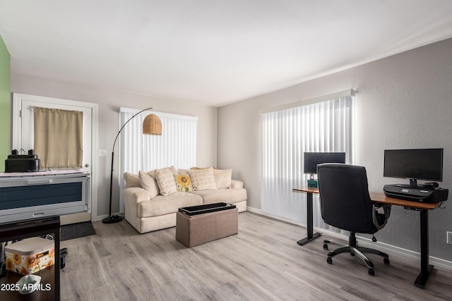 4240 N 67th Ln, Phoenix, AZ 85033 - office featuring wood finished floors and baseboards