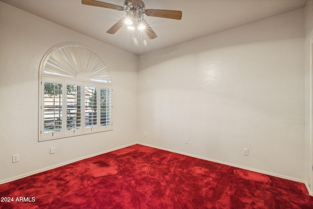 unfurnished room featuring carpet floors and ceiling fan