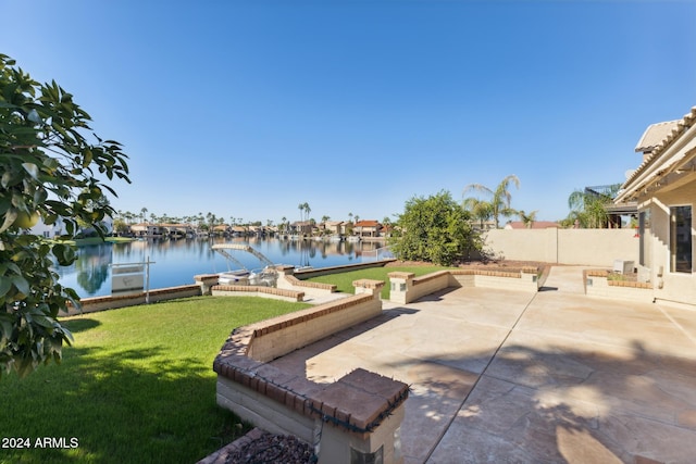 view of patio / terrace with a water view