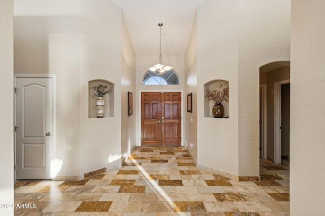 entrance foyer featuring a high ceiling