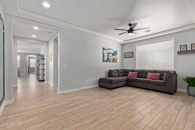 6931 W Spur Dr, Peoria, AZ 85383 - living room with ceiling fan, light wood-style flooring, recessed lighting, and baseboards
