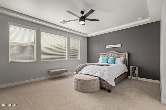 6931 W Spur Dr, Peoria, AZ 85383 - carpeted bedroom featuring baseboards, multiple windows, and ceiling fan
