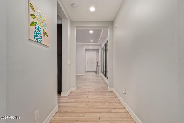 6931 W Spur Dr, Peoria, AZ 85383 - hall featuring light wood-style floors, baseboards, and recessed lighting