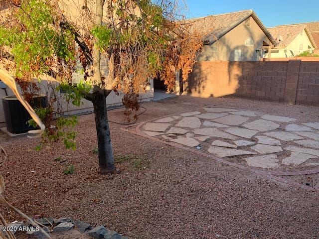 4533 E Glenhaven Dr, Phoenix, AZ 85048 - fenced backyard with a patio area
